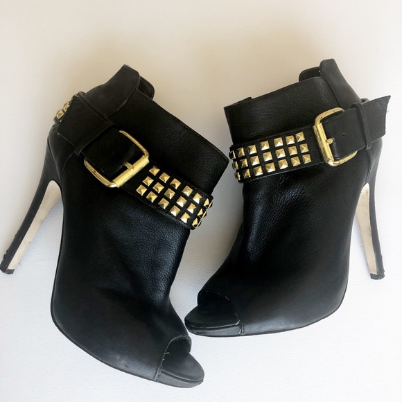 black ankle boots with gold studs